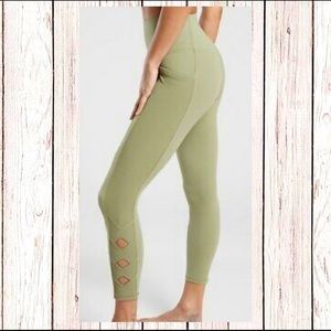 athleta salutation stash pocket II cutout tight 7/8 NWOT. Eucalyptus olive
